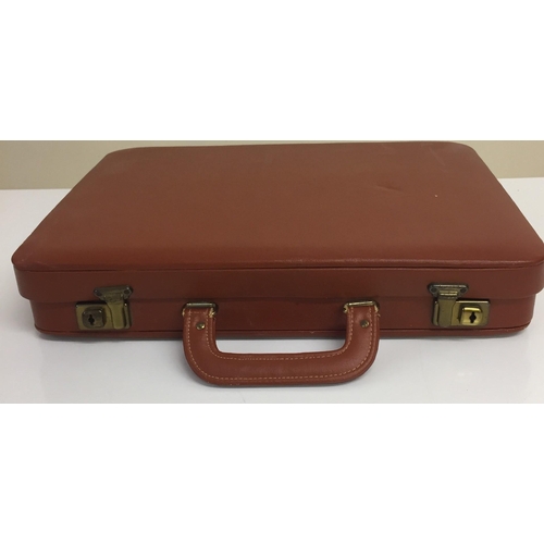 641 - A vintage, ladies leather writing case. Width 36cm