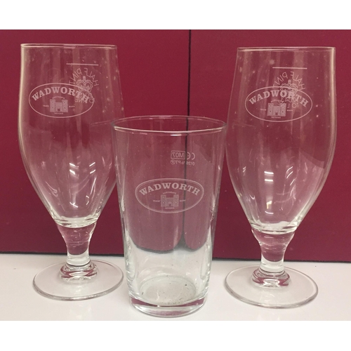 236 - A selection of new/boxed pub glasses. To include twelve 'Wadworth's' branded beer glasses(32cl), twe... 