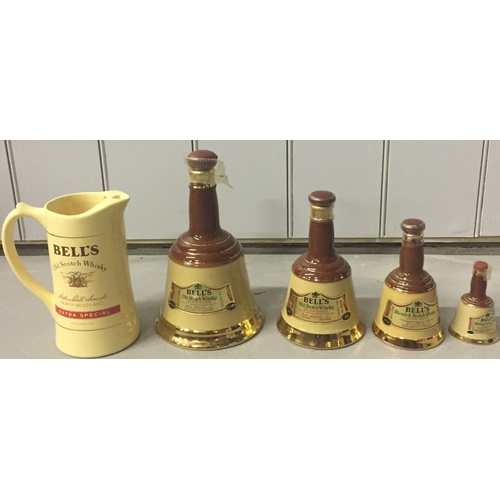 238 - A collection of four graduated 'Bell's Old Scotch Whisky' decanters, by 'Wade' (all still sealed), t... 