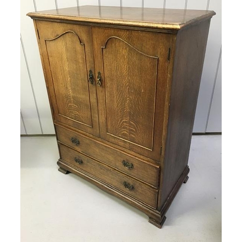 72 - An early 20th century, oak tallboy. Triple-shelved cupboard, over two drawers. Dimensions(cm) H115, ... 