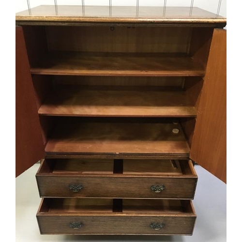 72 - An early 20th century, oak tallboy. Triple-shelved cupboard, over two drawers. Dimensions(cm) H115, ... 