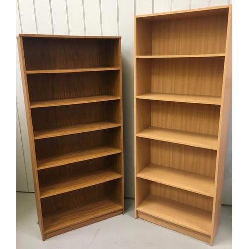 87 - Two contemporary bookcases. Oak coloured, with five shelves & beech coloured, with four shelves. Dim... 