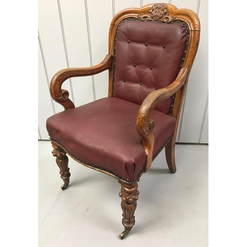 149 - An excellent, Victorian, walnut armchair. Good quality carvings to legs & backrest. Upholstered in b...