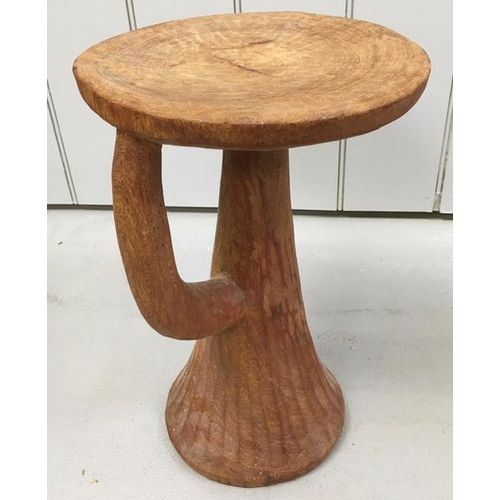 166 - A hand-carved 'Trumpet' stool. Dimensions(cm) H42, W27, D27.