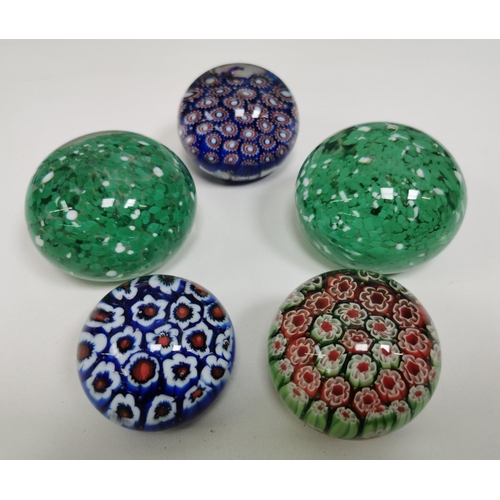 215 - A large collection of thirty-three good quality glass paperweights. To include a variety of patterns... 