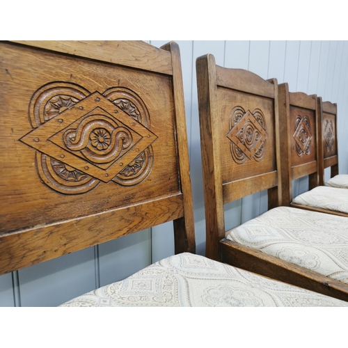 147D - A set of four, Edwardian carved-back dining chairs, with stretchered legs. Dimensions(cm) H86(47 to ... 