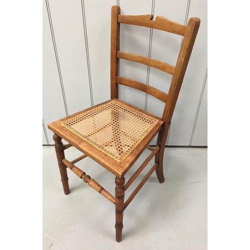 150A - A vintage, ladder-back chair, with bergere seat. Dimensions(cm) H85(43 to seat), W42, D44.