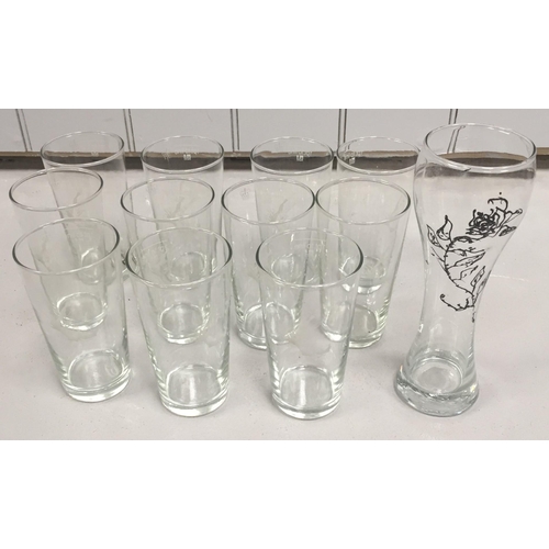 251 - A selection of branded pub glassware. To include eleven 'Jester' pint glasses & one other.