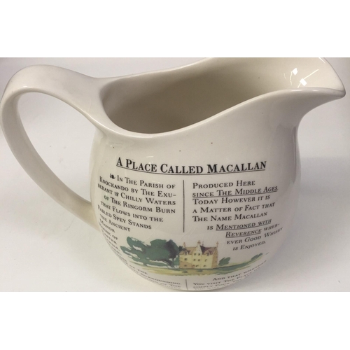 257 - A vintage, branded whiskey water jug - 'Macallan'.