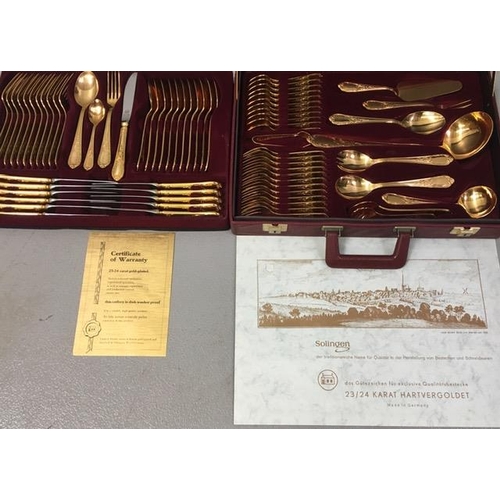 426 - A cased, 24ct gold-plated, twelve-place canteen of cutlery, by 'Solingen'. Sixty-nine pieces in tota... 