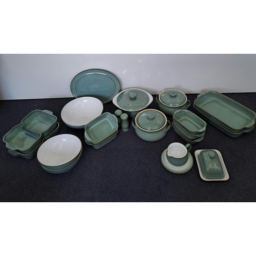 514 - A large quantity of 'Denby Regency Green' tableware. Approximately 100 pieces in total. To include p...