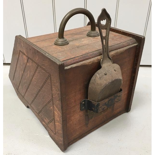 630 - A Victorian, oak & brass coal scuttle, with original pan. Dimensions(cm) H30, W32, D45.