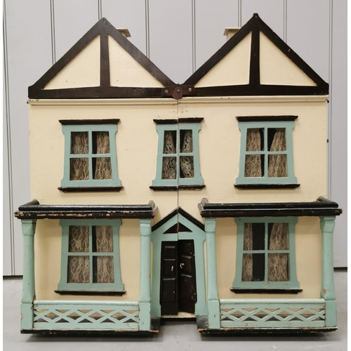 765 - A stunning, handmade dolls house c.1950's. Fully furnished with mid-century styling. Includes a larg... 