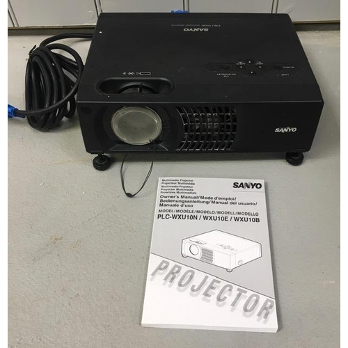 803 - A multimedia projector, by 'Sanyo'. Model no. PLC-WXU10B. Complete with connecting cables & manual. ... 