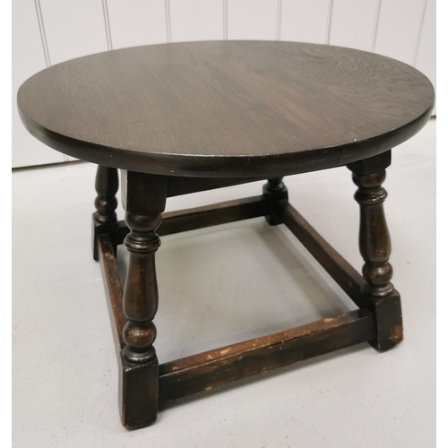 76 - A vintage, round walnut side table. Dimensions(cm) H48, W54, D54.