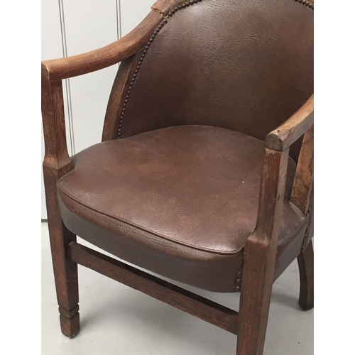 145C - An Edwardian, oak-framed/leather upholstered tub-style chair. Dimensions(cm) H85(47 to seat), W56, D... 