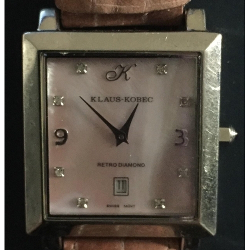 398 - A 'Retro Diamond' ladies wristwatch, by Klaus-Kobec. Model no. KKL1988. Features a leather strap & a... 