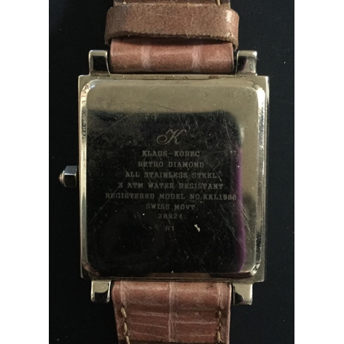 398 - A 'Retro Diamond' ladies wristwatch, by Klaus-Kobec. Model no. KKL1988. Features a leather strap & a... 