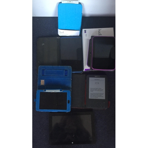 779 - A mixed lot of five tablets. To include an Amazon Kindle with case, Nexus with case, Hudl with case(... 