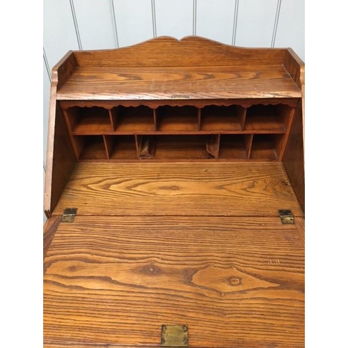 108 - A vintage oak bureau. Fall front, with fitted interior & four drawers. Dimensions(cm) H106, W70, D47... 