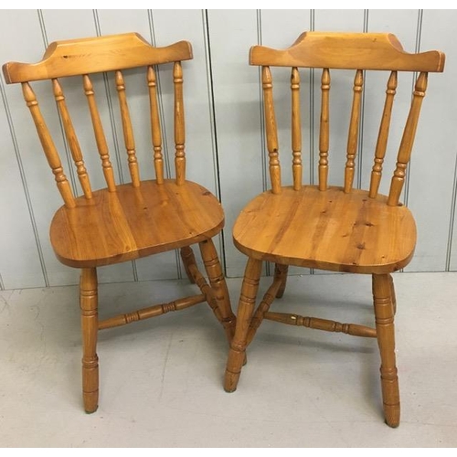 151 - A pair of pine farmhouse chairs. Dimensions(cm) H85(43 to seat), W44, D44.