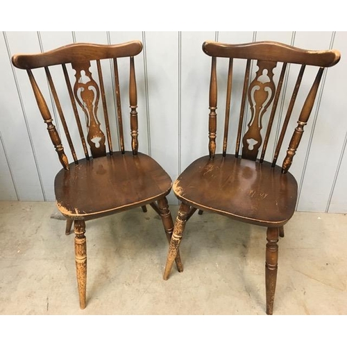 154 - A pair of vintage spindle-back kitchen chairs. Dimensions(cm) H88(46 to seat), W49, D50.