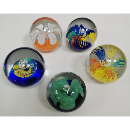 215 - A large collection of thirty-three good quality glass paperweights. To include a variety of patterns... 