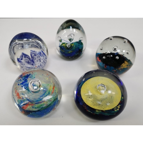 215 - A large collection of thirty-three good quality glass paperweights. To include a variety of patterns... 