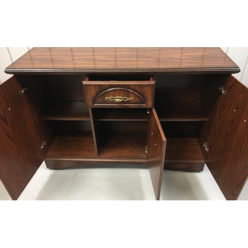 61 - A mahogany-veneered sideboard. Single, central drawer & three cupboards. Dimensions(cm) H79, W122, D... 