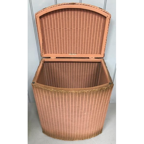 73B - Three items of cane furniture, including a Lloyd Loom 'Lusty' laundry basket, with similar styled tu... 