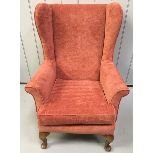 145B - A good quality wingback chair, upholstered in a terracotta-coloured fabric. Dimensions(cm) H100 (40 ... 