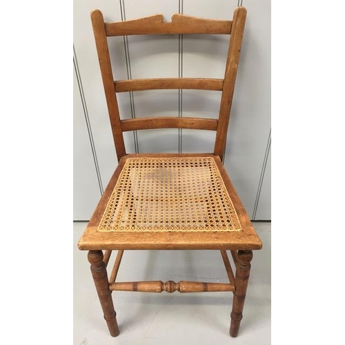 150A - A vintage, ladder-back chair, with bergere seat. Dimensions(cm) H85(43 to seat), W42, D44.