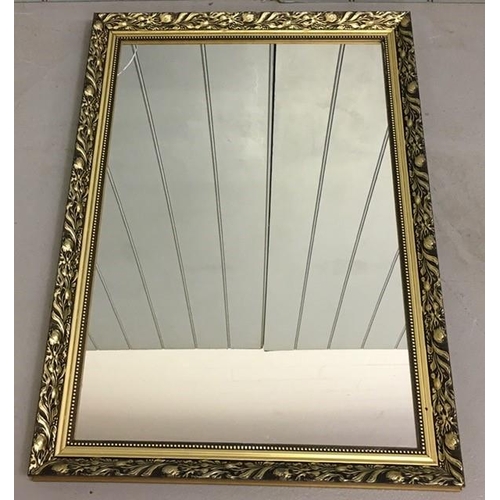 175 - A gilt-framed mantel mirror. Mirror has slight crack to one corner. 86cm x 60cm.