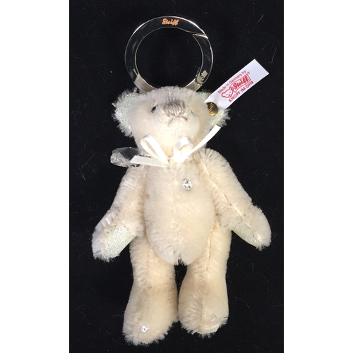 4014 - Steiff 'Crystal' Teddy Bear Bag Pendant. White mohair with accompanying ribbon, from 2009. Catalogue... 