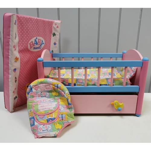 4128 - Baby Born Crib, Changing Mat, Carrier & Drawer of Accessories.  Unboxed.