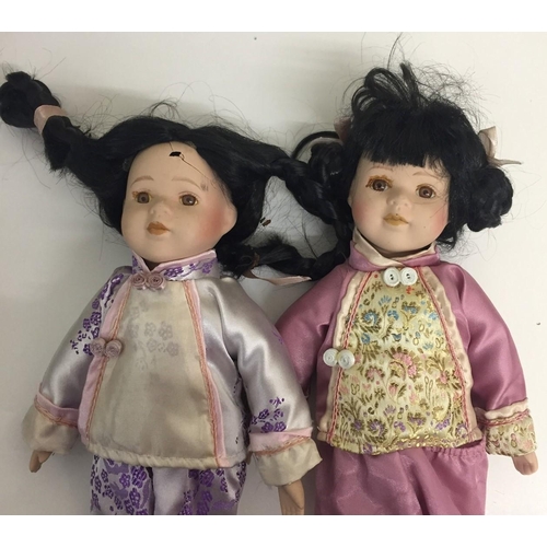 4190 - A collection of eleven souvenir/national costume dolls.