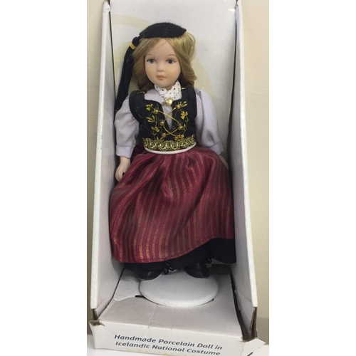 4190 - A collection of eleven souvenir/national costume dolls.