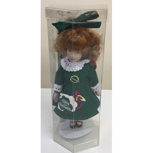 4190 - A collection of eleven souvenir/national costume dolls.