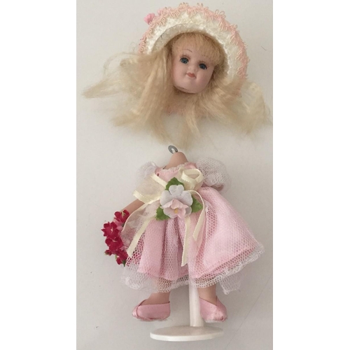 4191 - A collection of twelve porcelain dolls.