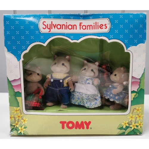 4296 - Sylvanian Families The Racoon Family.  Manufacturer/Model No: Tomy 3415.  Unchecked for completeness... 