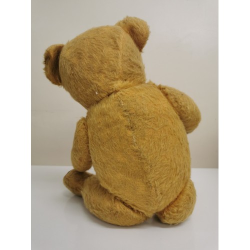 4086A - A mid-century Teddy Bear. Fully jointed, button-eyes, padded-paws. Height 45cm.