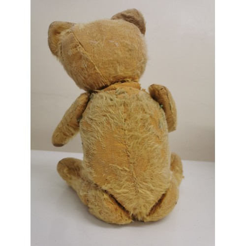 4086B - A mid-century Teddy Bear. Fully jointed, button-eyes, padded-paws. Height 37cm.