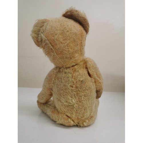 4086C - A mid-century Teddy Bear. Fully jointed, button-eyes, padded-paws. Height 30cm.