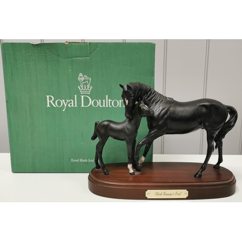 A boxed 'Royal Doulton - Black Beauty with foal' figurine. Dimensions(cm) H22, W30, D12.