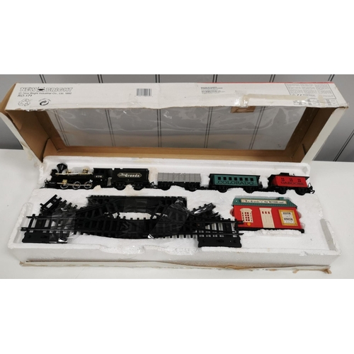 2704 - A boxed, battery powered, 'New Bright' Rio Grande train set. To include engine, three carriages, sta... 