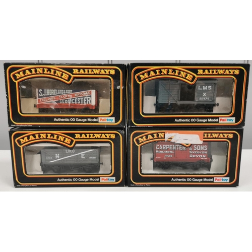 2711 - A collection of eleven, boxed Palitoy Mainline OO gauge plank wagons.  Model no's 37-126; 37-148; 37... 