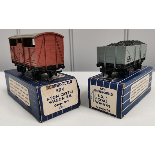 2722 - A collection of nine, boxed Hornby-Dublo wagons. To include: 8-ton Cattle Wagon B.R.; 6 UGB Coal Wag... 