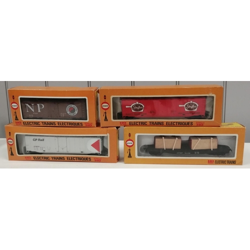 2762 - A collection of seven, boxed HO scale Wagons & Engine, by 'Tyco' & Cox'. To include Tyco - Stock Car... 