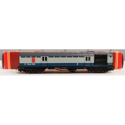 2773 - A boxed Hornby Railways B.R. Wagon, together with a boxed Royal Mail mail coach. Model no's. R217 & ... 