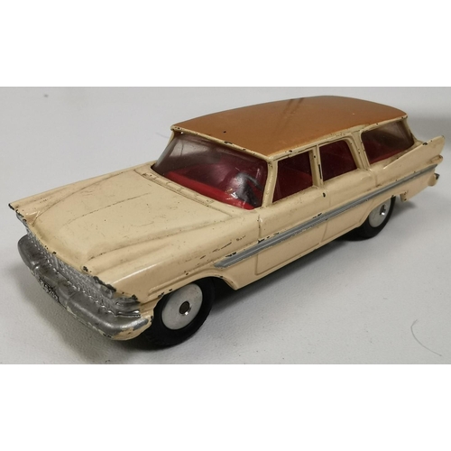 2230 - Corgi 219 - 'Plymouth Sports Suburban Station Wagon', with reproduction box, together with three oth... 